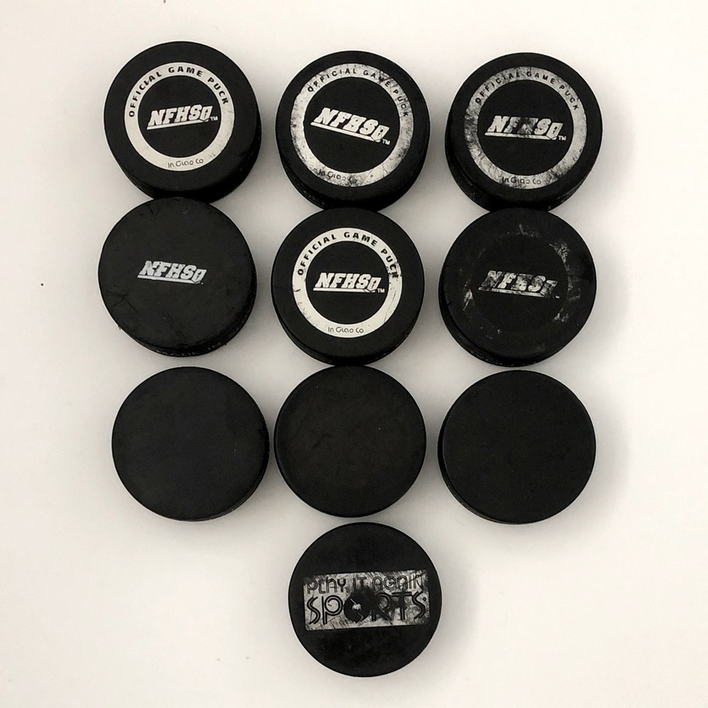 Lot of 10 used official black Hockey pucks